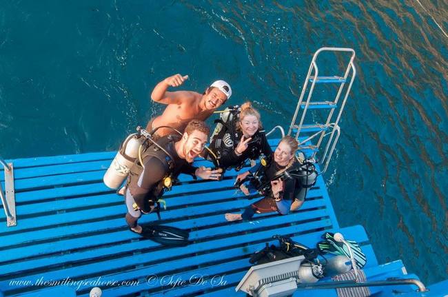 Divers celebrating their Open Water, Advanced Open Water and Nitrox certifications